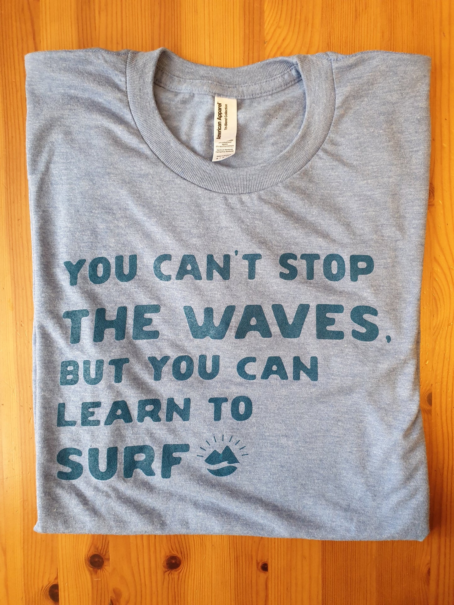 You can't stop the waves, but you can learn to surf tee